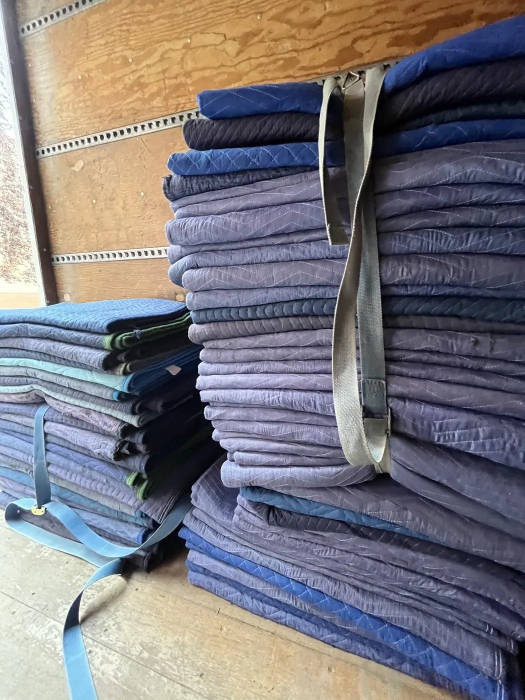 Quilted moving blankets ready for furniture protection