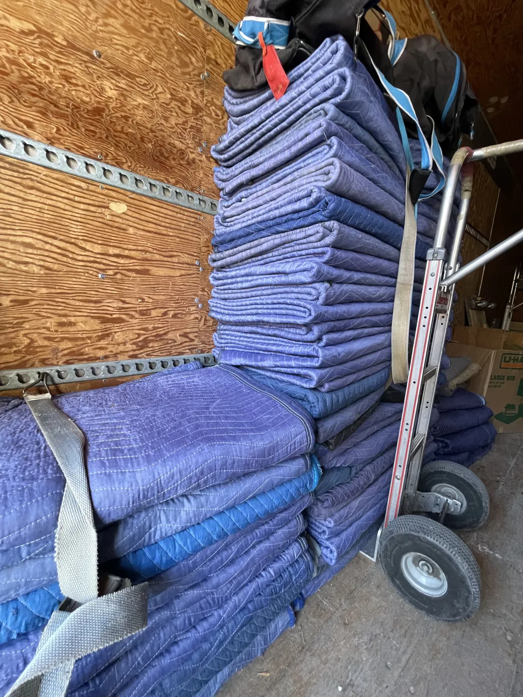Quilted moving blankets ready for furniture protection