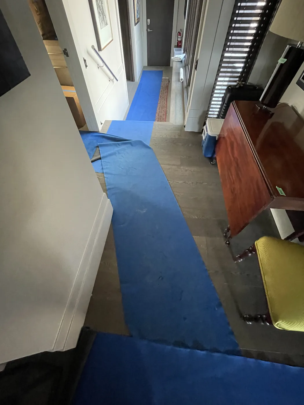 Protective floor runners along hallways and stairs