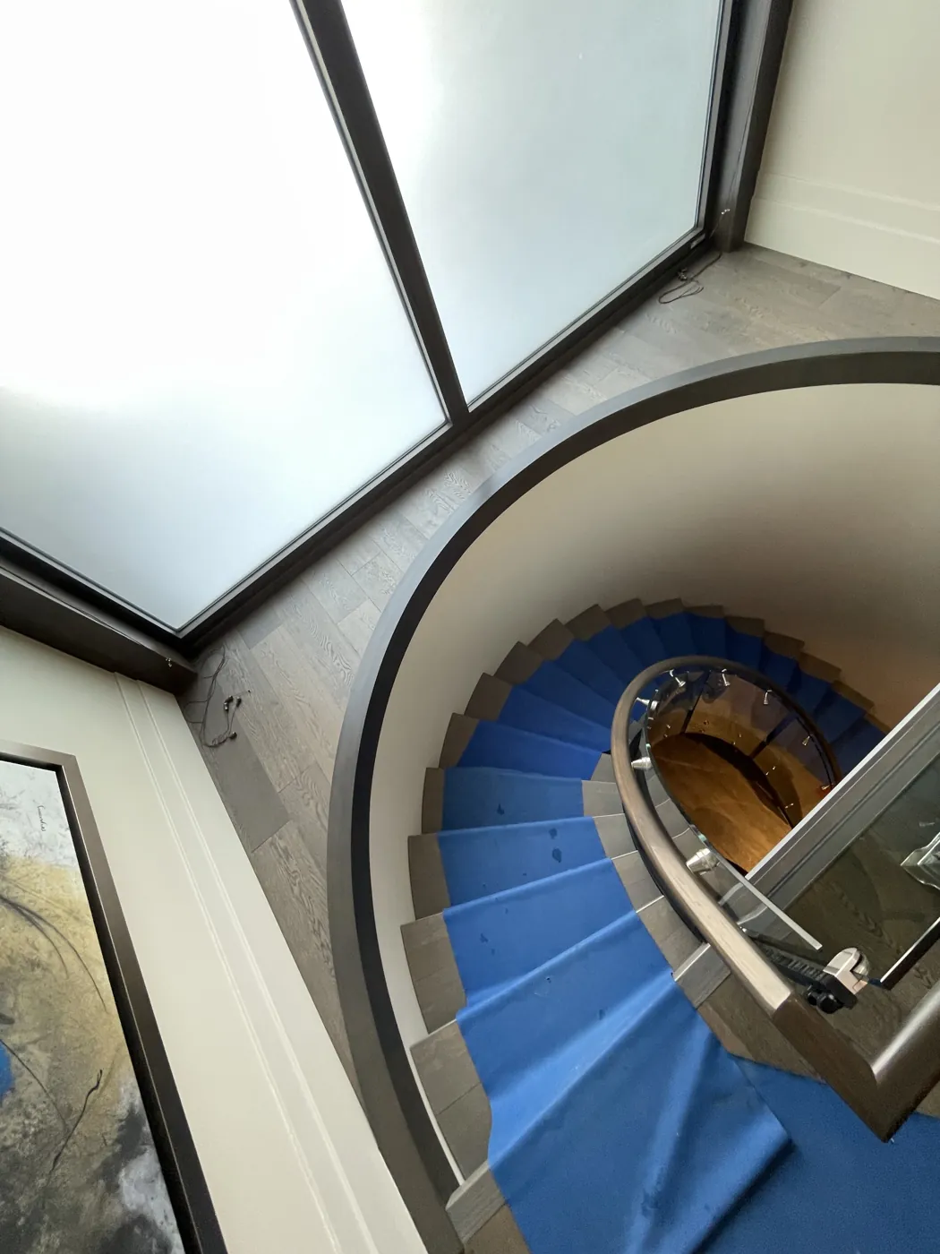 Protective floor runners along hallways and stairs