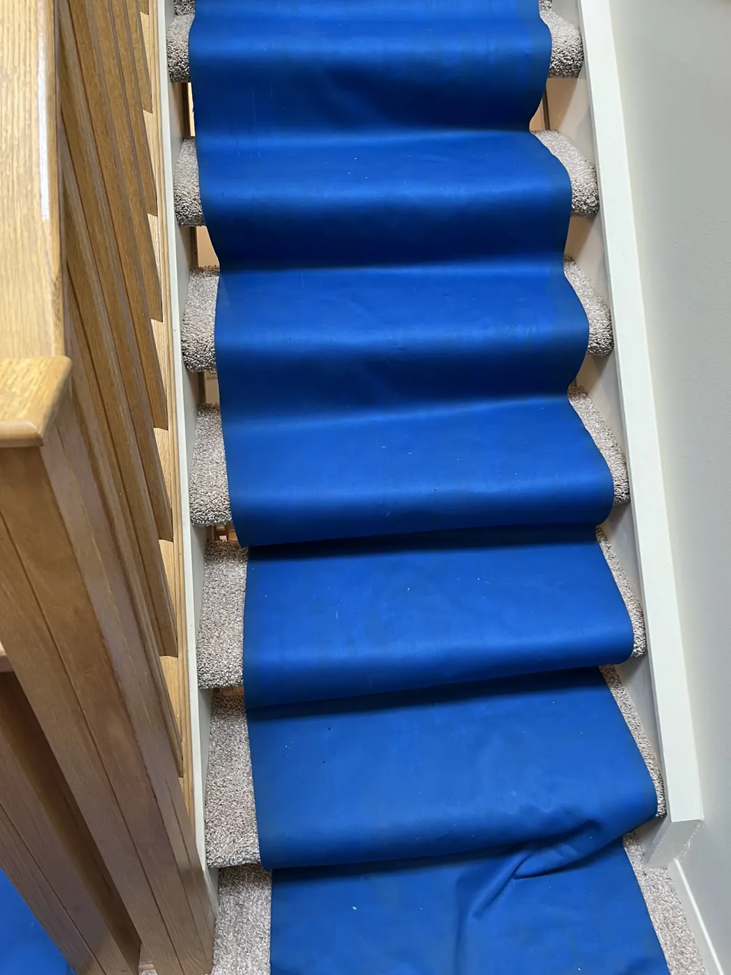 Protective floor runners along hallways and stairs