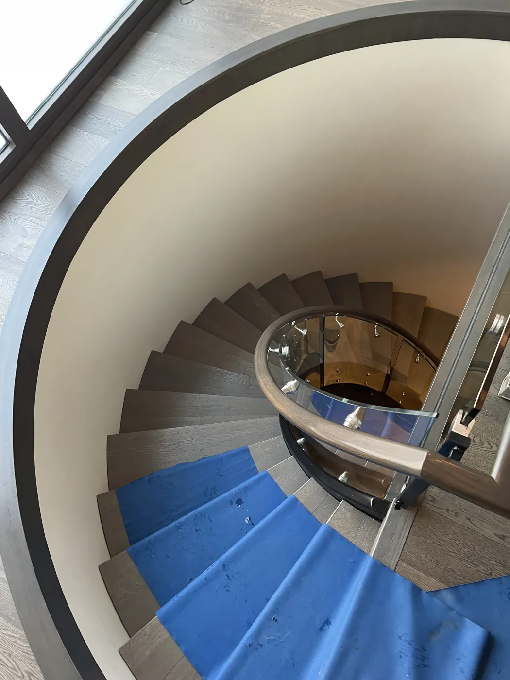 Protective floor runners along hallways and stairs
