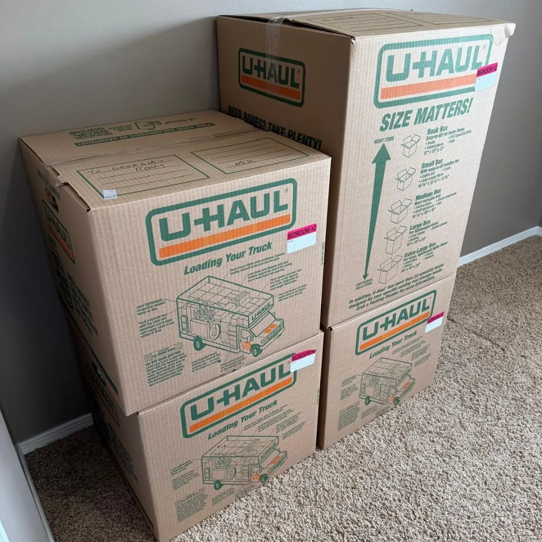 Moving boxes organized inside a home