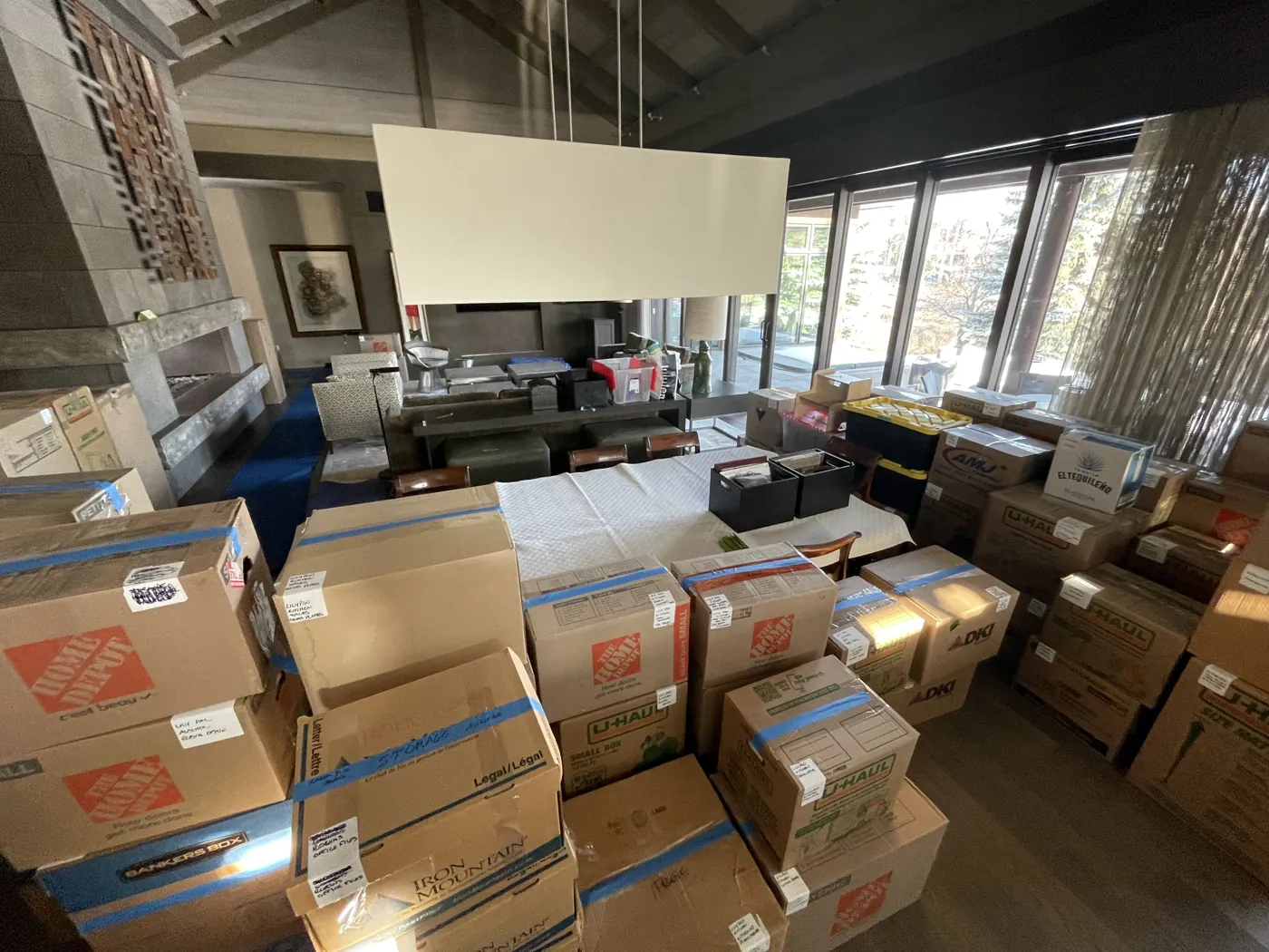 Moving boxes organized inside a home