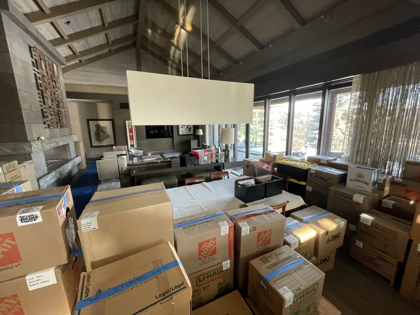 Moving boxes organized inside a home