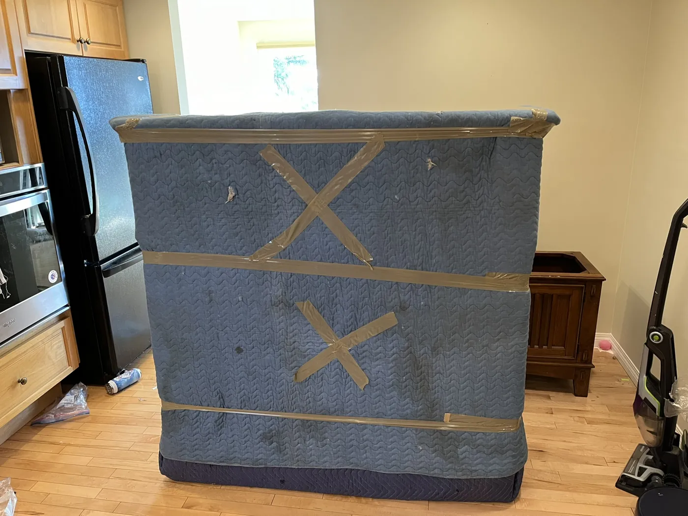 Furniture secured in padded protective moving materials