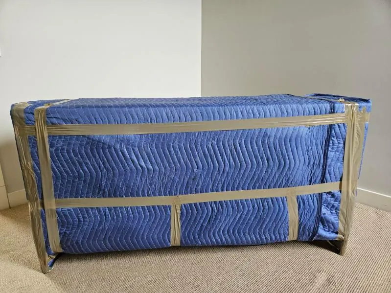 Furniture secured in padded protective moving materials
