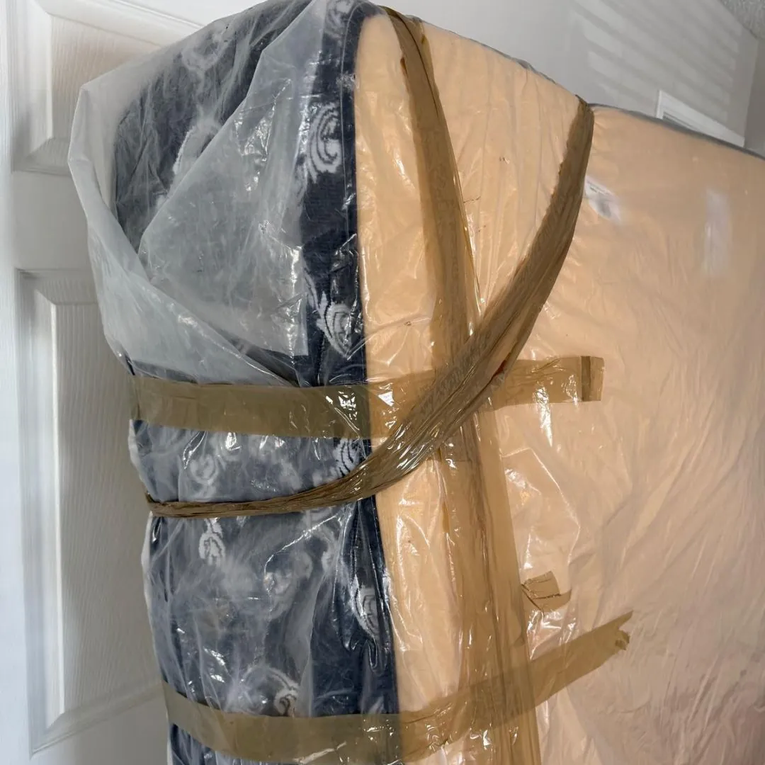 Furniture secured in padded protective moving materials
