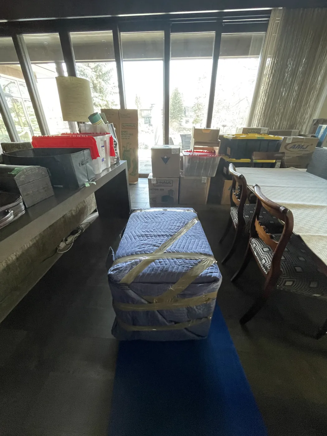 Furniture secured in padded protective moving materials