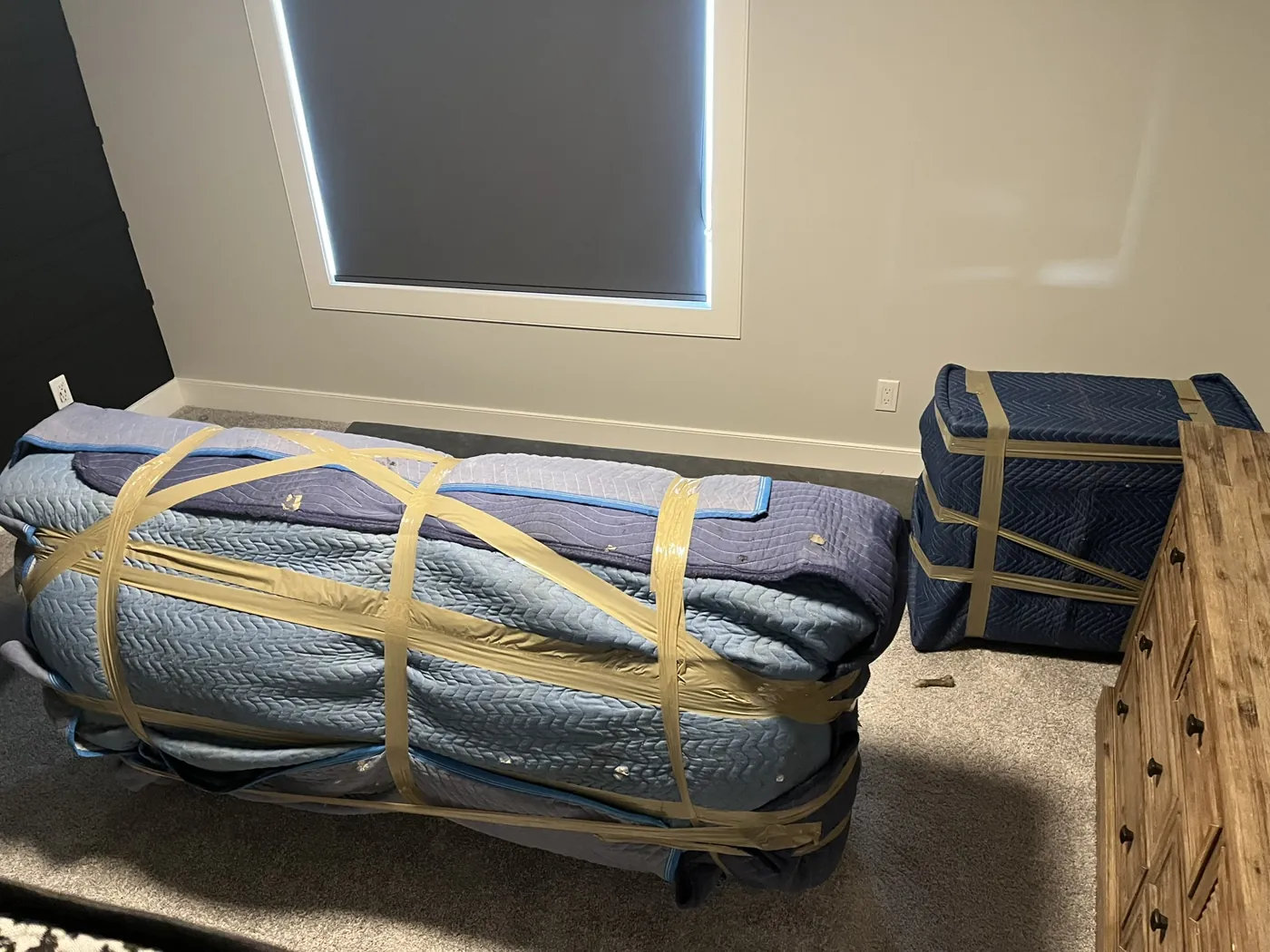 Furniture secured in padded protective moving materials